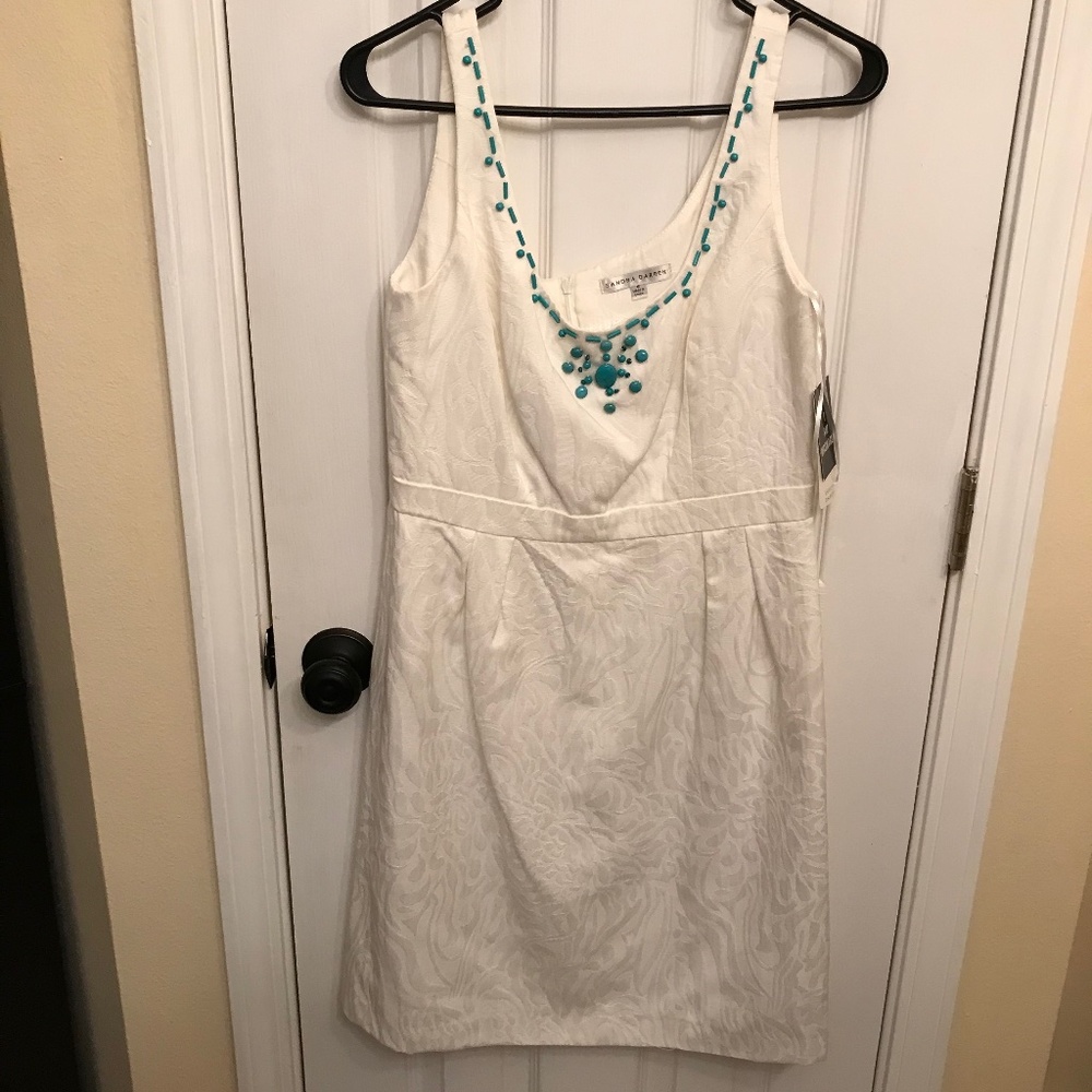 White Sundress with turquoise bead Detail